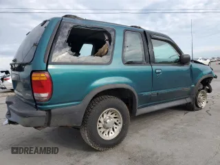 1998 Ford Explorer Sport with VIN 1FMYU22X7WUB73136, listed as a Copart auction lot 54338255 with 197,323 mi miles and Salvage title. Bid and sale history available at DreamBid. Image 3.