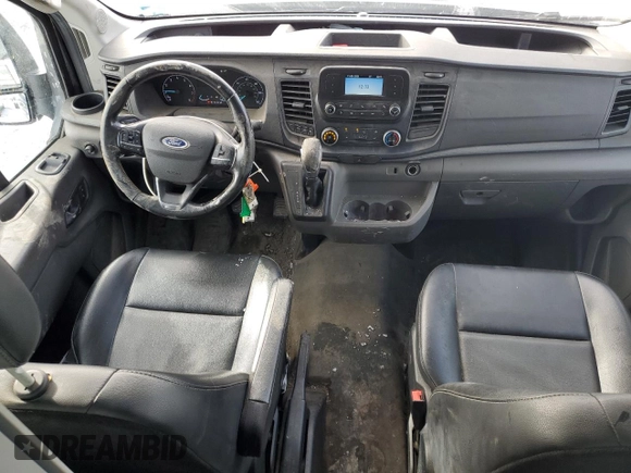 2020 Ford Transit Cargo with VIN 1FTBR2X81LKB73704, listed as a Copart auction lot 87871045 with 184,672 mi miles and Clean Title. Bid and sale history available at DreamBid. Image 8.