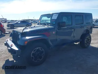 2015 Jeep Wrangler Unlimited Rubicon with VIN 1C4BJWFG7FL525724, listed as a IAAI auction lot 41394059 with 132,058 mi miles. Bid and sale history available at carsss.com. Image 18.
