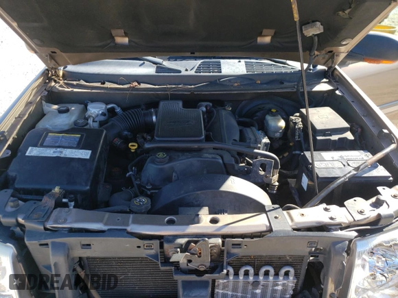 2002 GMC Envoy SLT with VIN 1GKDT13S022456264, listed as a Copart auction lot 76556004 with 230,954 mi miles and Salvage Title. Bid and sale history available at DreamBid. Image 12.