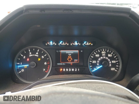 2015 Ford F-150 XL with VIN 1FTNF1EG1FKD00398, listed as a Copart auction lot 72774054 with 164,052 mi miles and Salvage title. Bid and sale history available at DreamBid. Image 9.