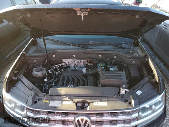 2018 Volkswagen Atlas SE z VIN 1V2FR2CA9JC574806, wystawiony jako Copart lot #80307314 z przebiegiem 65 282 mil mil oraz Szkoda całkowita • Salvage title. Historia ofert i sprzedaży dostępna na DreamBid. Obrazek 12.