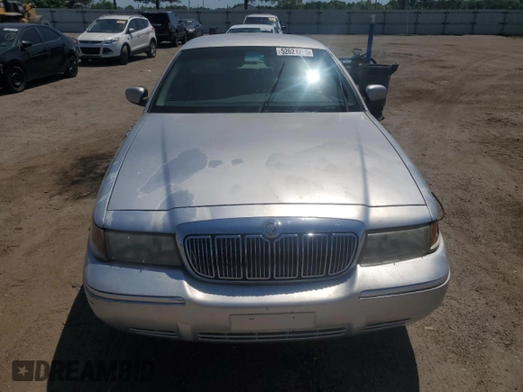 1999 Mercury Grand Marquis LS z VIN 2MEFM75W5XX673218, wystawiony jako Copart lot #52621285 z przebiegiem 163 642 mil mil oraz Szkoda całkowita • Salvage title. Historia ofert i sprzedaży dostępna na DreamBid. Obrazek 5.