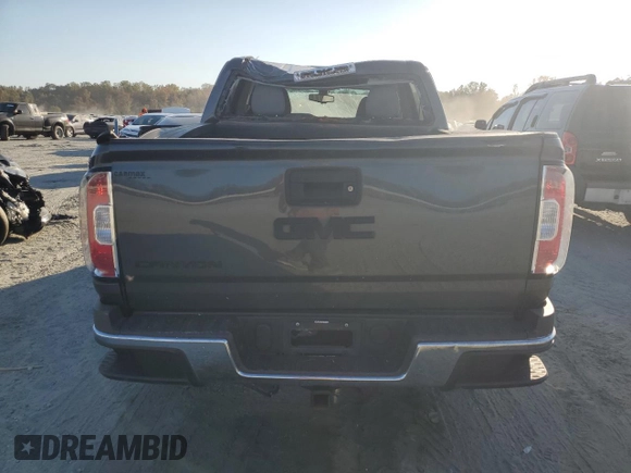 2017 GMC Canyon 2WD with VIN 1GTG5BEA7H1227043, listed as a Copart auction lot 77062374 with 101,338 mi miles and Salvage Title. Bid and sale history available at carsss.com. Image 6.