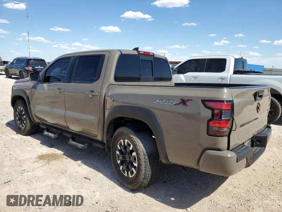 2022 Nissan Frontier Pro-X with VIN 1N6ED1EJ3NN606031, listed as a Copart auction lot 63337253 with 31,947 mi miles and Salvage title. Bid and sale history available at DreamBid. Image 2.