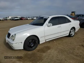 2000 Mercedes-Benz E z VIN WDBJF65G7YA957337, wystawiony jako Copart lot #57074095 z przebiegiem 211 493 mil mil oraz Szkoda całkowita • Salvage title. Historia ofert i sprzedaży dostępna na DreamBid. Obrazek 1.