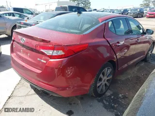 2013 Kia Optima SX w/Limited Pkg with VIN 5XXGR4A66DG137530, listed as a IAAI auction lot 41940486 with 124,605 mi miles. Bid and sale history available at carsss.com. Image 4.