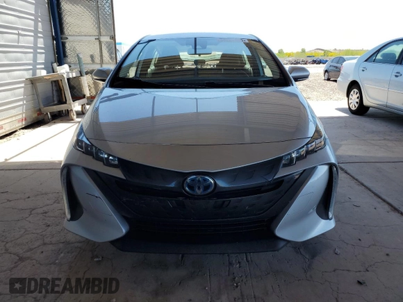 2021 Toyota Prius LE z VIN JTDKAMFP6M3183538, wystawiony jako Copart lot #54267425 z przebiegiem 29 374 mil mil oraz Szkoda całkowita • Salvage title. Historia ofert i sprzedaży dostępna na DreamBid. Obrazek 5.