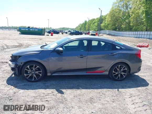 2019 Honda Civic Sport with VIN 2HGFC2F85KH576547, listed as a IAAI auction lot 42024497 with 86,468 mi miles and . Bid and sale history available at DreamBid. Image 14.