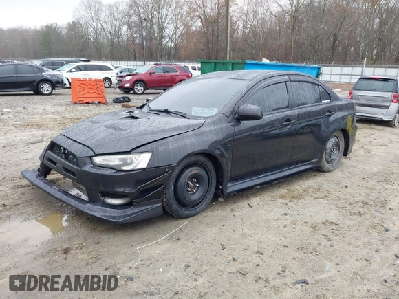 2010 Mitsubishi Lancer Evolution GSR with VIN JA32W8FV1AU012725, listed as a IAAI auction lot 41542629 with 124,347 mi miles and . Bid and sale history available at DreamBid. Image 2.