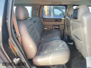 2003 Hummer H2 with VIN 5GRGN23U33H114427, listed as a Copart auction lot 76528834 with 133,571 mi miles and Salvage Title. Bid and sale history available at carsss.com. Image 11.