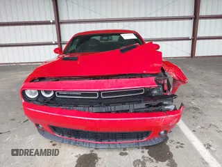 2016 Dodge Challenger SXT Plus z VIN 2C3CDZAG3GH114117, wystawiony jako IAAI lot #42334494 z przebiegiem 131 667 mil mil oraz . Historia ofert i sprzedaży dostępna na DreamBid. Obrazek 12.