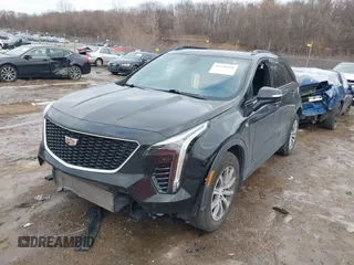 2021 Cadillac XT4 AWD Sport with VIN 1GYFZFR49MF065225, listed as a IAAI auction lot 41191994 with 58,095 mi miles and . Bid and sale history available at DreamBid. Image 2.