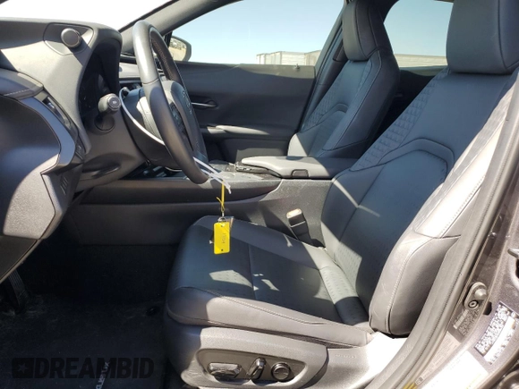 2022 Lexus UX with VIN JTHX3JBH4N2056306, listed as a Copart auction lot 72589624 with 11,991 mi miles and Salvage Title. Bid and sale history available at carsss.com. Image 7.