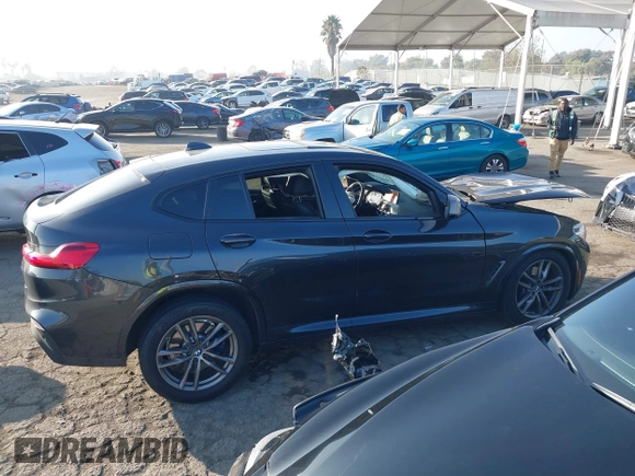 2019 BMW X4 M40i z VIN 5UXUJ5C54KLJ64077, wystawiony jako IAAI lot #41012233 z przebiegiem 40 737 mil mil oraz . Historia ofert i sprzedaży dostępna na DreamBid. Obrazek 12.