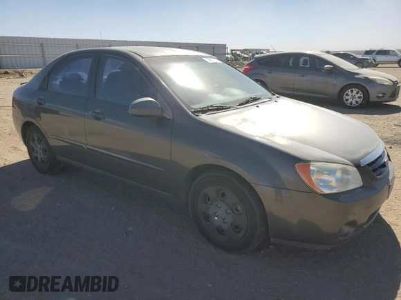 2006 Kia Spectra EX with VIN KNAFE122X65277053, listed as a Copart auction lot 75697314 with 147,156 mi miles and Salvage Title. Bid and sale history available at carsss.com. Image 4.