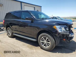 2021 Ford Expedition XL with VIN 1FMJU1GTXMEA18203, listed as a Copart auction lot 60987495 with 72,886 mi miles and Salvage title. Bid and sale history available at DreamBid. Image 4.