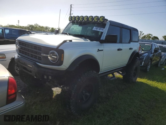 2022 Ford Bronco with VIN 1FMEE5BP4NLB45977, listed as a Copart auction lot 74874914 with 13,719 mi miles and Salvage Title. Bid and sale history available at DreamBid. Image 1.