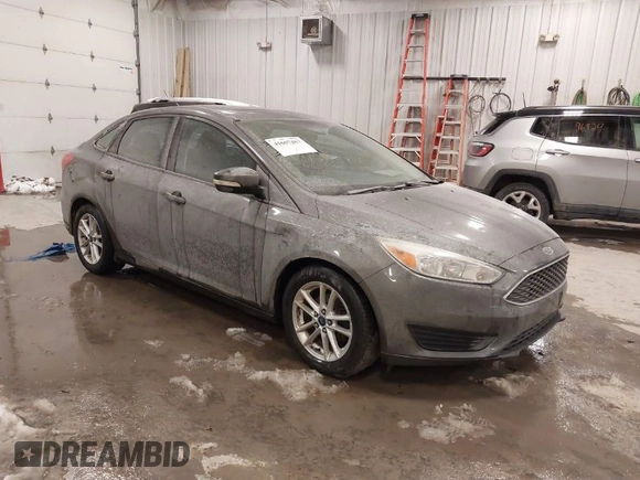 2015 Ford Focus SE with VIN 1FADP3F2XFL342480, listed as a IAAI auction lot 41607487 with 103,530 mi miles. Bid and sale history available at carsss.com. Image 1.