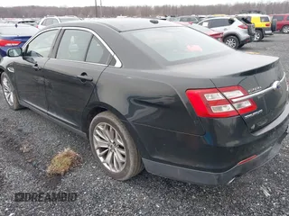 2014 Ford Taurus Limited with VIN 1FAHP2F81EG113984, listed as a IAAI auction lot 41542792 with 213,206 mi miles. Bid and sale history available at carsss.com. Image 3.