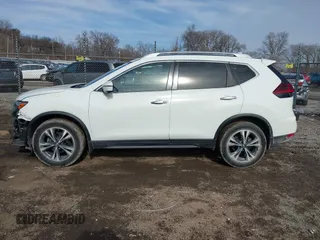 2019 Nissan Rogue SL with VIN 5N1AT2MV9KC784379, listed as a IAAI auction lot 41532650 with 99,338 mi miles and . Bid and sale history available at carsss.com. Image 14.