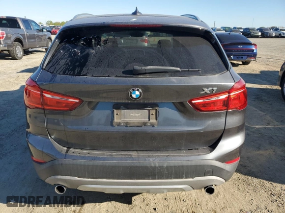 2017 BMW X1 sDrive28i with VIN WBXHU7C3XH5H36874, listed as a Copart auction lot 50607235 with 100,458 mi miles and Clean Title. Bid and sale history available at carsss.com. Image 6.
