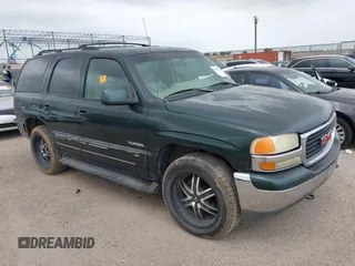 2002 GMC Yukon SLT z VIN 1GKEC13Z62R233154, wystawiony jako IAAI lot #42229172 z przebiegiem Nie podano mil oraz . Historia ofert i sprzedaży dostępna na DreamBid. Obrazek 1.