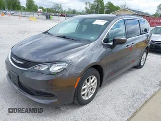 2021 Chrysler Voyager LXi with VIN 2C4RC1DG2MR542658, listed as a IAAI auction lot 42171818 with 62,123 mi miles and . Bid and sale history available at DreamBid. Image 2.
