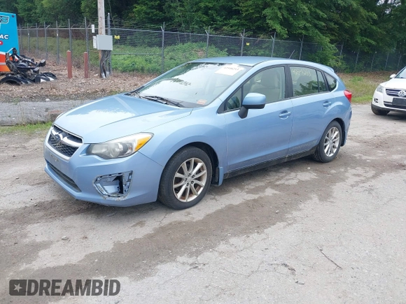 2012 Subaru Impreza Premium with VIN JF1GPAB64CH238673, listed as a IAAI auction lot 42548253 with 147,734 mi miles and . Bid and sale history available at DreamBid. Image 2.