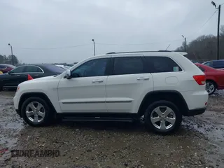 2012 Jeep Grand Cherokee Limited with VIN 1C4RJEBG7CC270910, listed as a IAAI auction lot 41761760 with 124,785 mi miles. Bid and sale history available at carsss.com. Image 14.