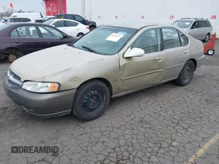 2001 Nissan Altima GXE with VIN 1N4DL01D71C151627, listed as a IAAI auction lot 41632277 with 228,944 mi miles. Bid and sale history available at carsss.com. Image 2.