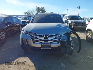 2024 Hyundai Santa Cruz SEL z VIN 5NTJC4AE3RH099170, wystawiony jako IAAI lot #41285989 z przebiegiem 38 112 mil mil oraz . Historia ofert i sprzedaży dostępna na DreamBid. Obrazek 13.