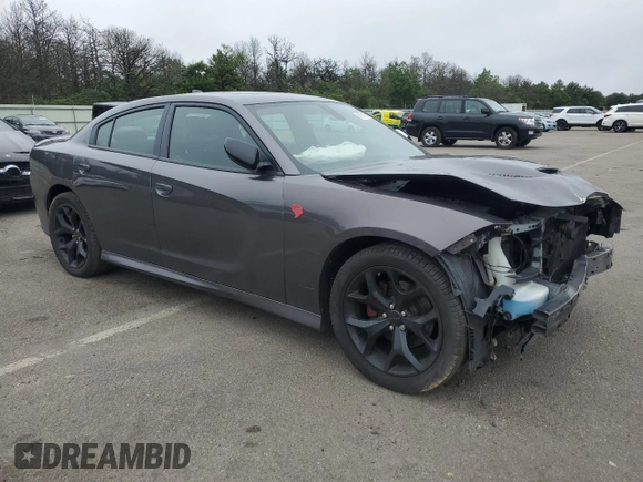 2016 Dodge Charger R/T with VIN 2C3CDXCT3GH298103, listed as a Copart auction lot 61351185 with 61,648 mi miles and Salvage title. Bid and sale history available at DreamBid. Image 4.
