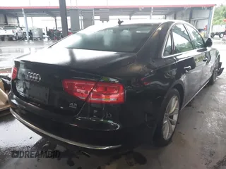 2012 Audi A8 with VIN WAUAVAFD9CN006499, listed as a IAAI auction lot 42461402 with 57,232 mi miles and . Bid and sale history available at DreamBid. Image 4.