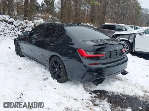 2021 BMW 3 Series M340i xDrive with VIN 3MW5U9J01M8B63472, listed as a IAAI auction lot 41425056 with 63,223 mi miles. Bid and sale history available at carsss.com. Image 3.