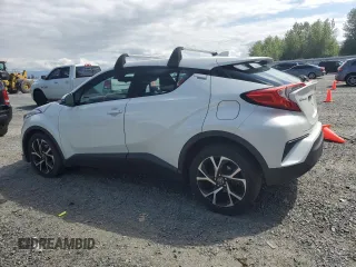 2018 Toyota C-HR XLE with VIN NMTKHMBX9JR060424, listed as a Copart auction lot 57913775 with 104,847 mi miles and Salvage title. Bid and sale history available at DreamBid. Image 2.