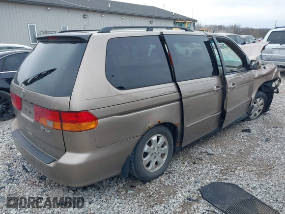 2004 Honda Odyssey EX z VIN 5FNRL18634B004127, wystawiony jako IAAI lot #41854878 z przebiegiem 242 601 mil mil oraz . Historia ofert i sprzedaży dostępna na DreamBid. Obrazek 4.