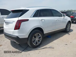 2021 Cadillac XT5 FWD Premium Luxury z VIN 1GYKNCR42MZ174309, wystawiony jako IAAI lot #42051341 z przebiegiem 75 544 mil mil oraz . Historia ofert i sprzedaży dostępna na DreamBid. Obrazek 4.