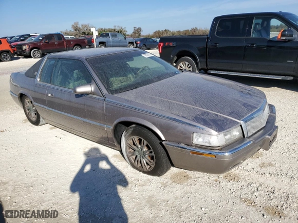1996 Cadillac Eldorado with VIN 1G6EL12Y6TU613813, listed as a Copart auction lot 78274114 with NaN miles and Salvage Title. Bid and sale history available at carsss.com. Image 4.