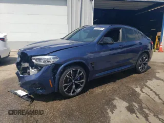 2020 BMW X4 M Competition z VIN 5YMUJ0C08L9C42121, wystawiony jako Copart lot #52499963 z przebiegiem 20 984 mil mil oraz . Historia ofert i sprzedaży dostępna na DreamBid. Obrazek 1.