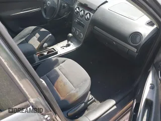 2005 Mazda 6 Sport S with VIN 1YVHP80DX55M60044, listed as a IAAI auction lot 42181650 with 161,463 mi miles and . Bid and sale history available at DreamBid. Image 5.