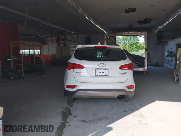 2017 Hyundai Santa Fe Ultimate with VIN 5XYZWDLA2HG491338, listed as a IAAI auction lot 42590671 with 114,521 mi miles and . Bid and sale history available at DreamBid. Image 17.