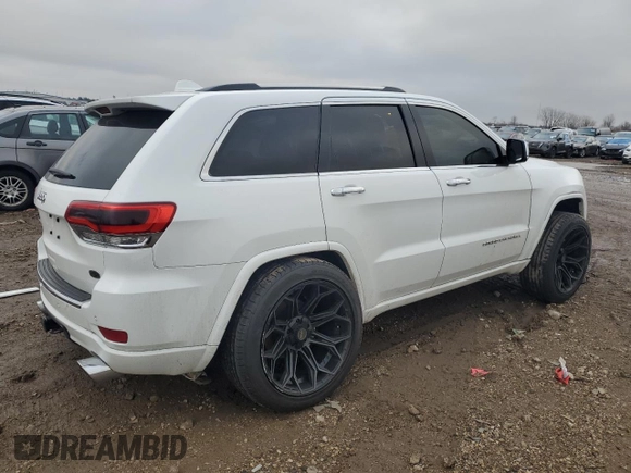 2014 Jeep Grand Cherokee Overland with VIN 1C4RJFCG7EC572298, listed as a Copart auction lot 83970004 with 104,861 mi miles and Salvage Title. Bid and sale history available at DreamBid. Image 3.