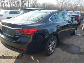 2014 Mazda 6 i Grand Touring with VIN JM1GJ1W66E1162519, listed as a IAAI auction lot 41801957 with 121,586 mi miles. Bid and sale history available at carsss.com. Image 4.