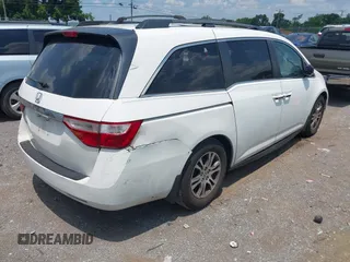 2012 Honda Odyssey EX-L with VIN 5FNRL5H63CB063684, listed as a IAAI auction lot 42576742 with 170,656 mi miles and . Bid and sale history available at DreamBid. Image 4.