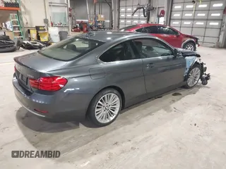 2014 BMW 4 Series 428i xDrive with VIN WBA3N9C56EF721564, listed as a IAAI auction lot 41737409 with 42,052 mi miles and . Bid and sale history available at DreamBid. Image 4.