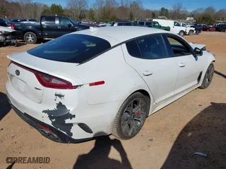 2019 Kia Stinger GT with VIN KNAE35LC8K6050559, listed as a IAAI auction lot 41699927 with 85,944 mi miles. Bid and sale history available at carsss.com. Image 4.