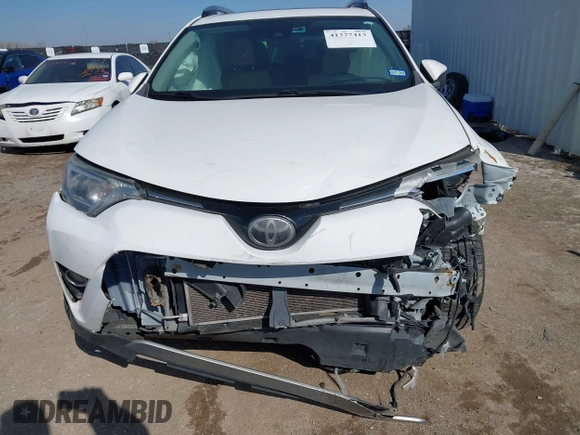 2018 Toyota RAV4 XLE with VIN JTMWFREV7JJ728184, listed as a IAAI auction lot 41377413 with 117,957 mi miles. Bid and sale history available at carsss.com. Image 6.