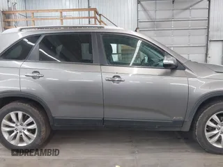 2011 Kia Sorento LX with VIN 5XYKTDA2XBG119730, listed as a IAAI auction lot 41754502 with 176,034 mi miles. Bid and sale history available at carsss.com. Image 13.