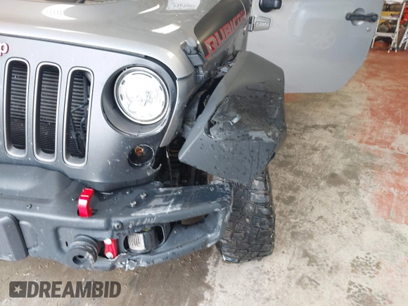 2017 Jeep Wrangler Unlimited Rubicon Recon z VIN 1C4BJWFG5HL687757, wystawiony jako IAAI lot #42367095 z przebiegiem 48 441 mil mil oraz . Historia ofert i sprzedaży dostępna na DreamBid. Obrazek 6.